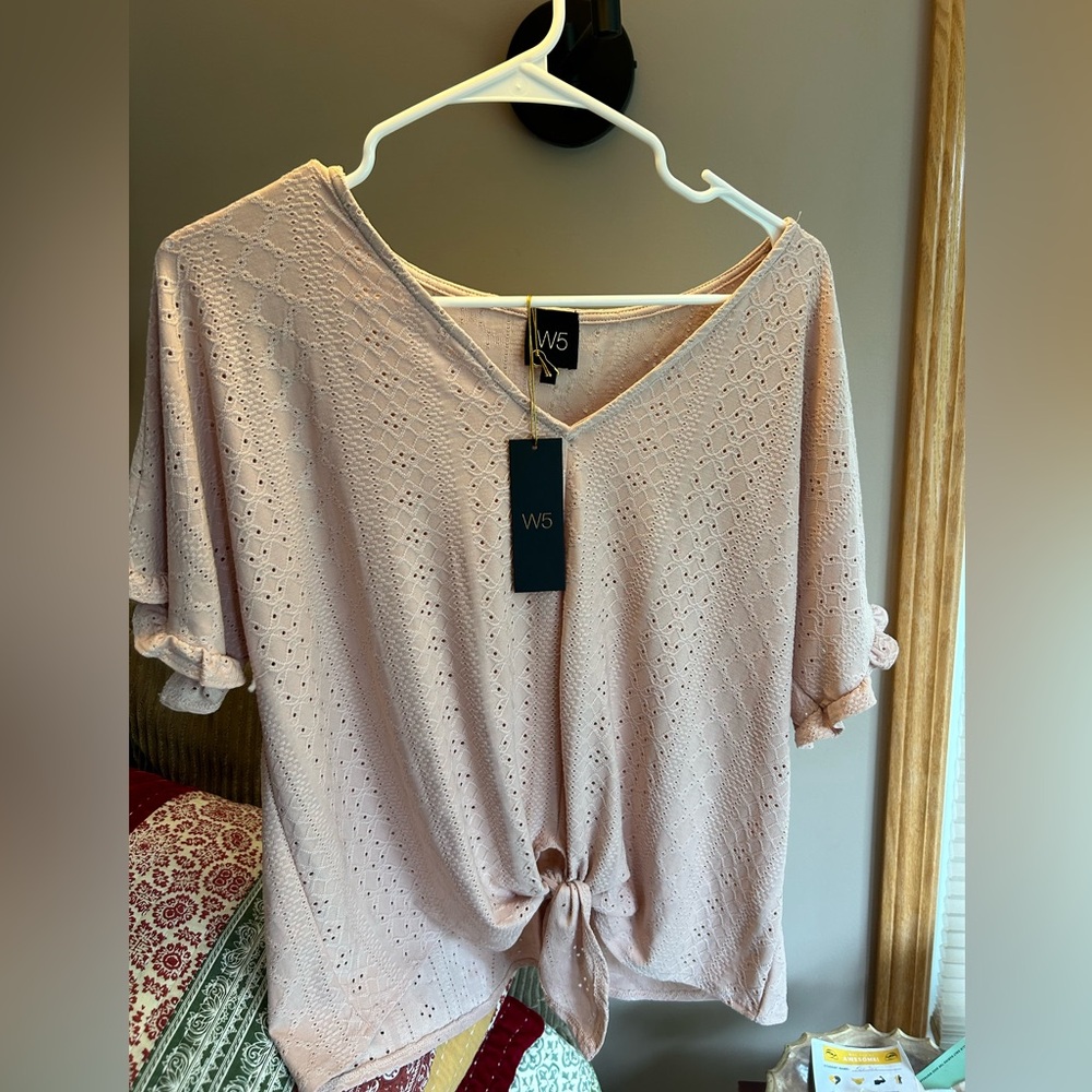 Women's blush color summer top.